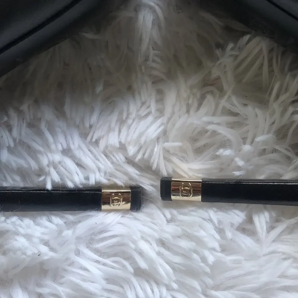 CHANEL title black